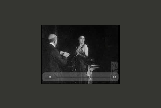 Still from an old film of de László painting a half-length portrait (click to go to the clip).