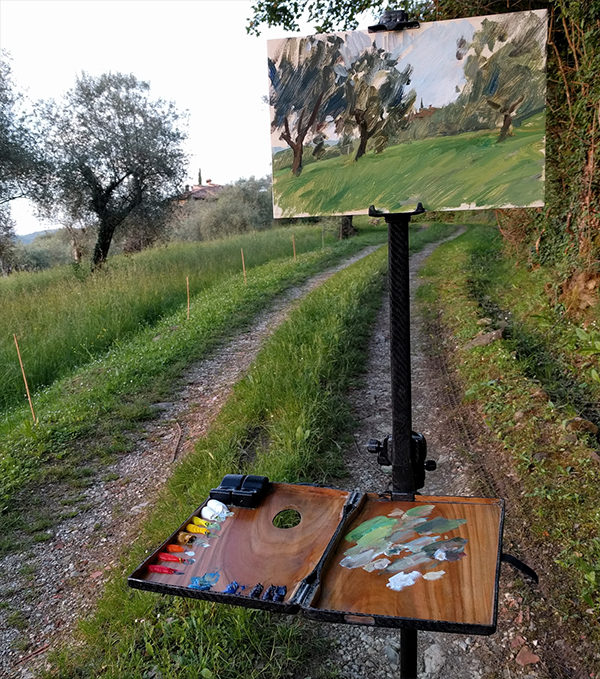 Image of a carbon fiber pochade box and mast system for plein air landscape painting.